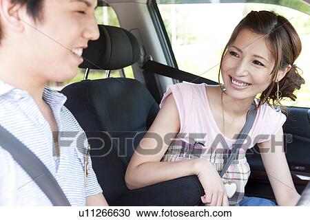 Young Couple in Car View Large Photo Image Stock Image - Young Couple in Car. Fotosearch