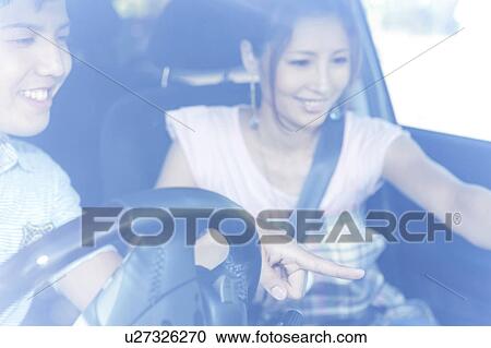 Young Couple in Car View Large Photo Image Stock Image - Young Couple in Car. Fotosearch