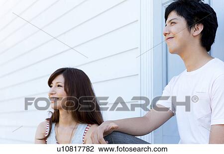 Young Couple Sitting on Step View Large Photo Image Stock Image - Young Couple Sitting on Step. Fotosearch