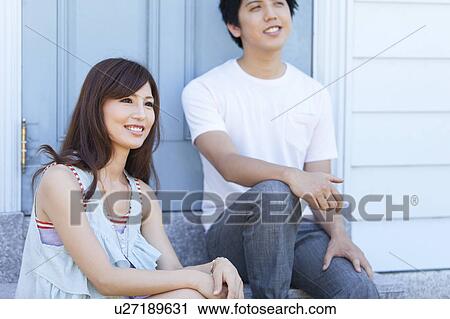 Young Couple Sitting on Step View Large Photo Image Stock Image - Young Couple Sitting on Step. Fotosearch