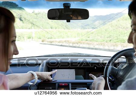 Young Couple Using GPS in Car View Large Photo Image Stock Photograph - Young Couple Using GPS in Car. Fotosearch