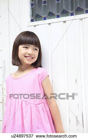 Young Girl Leaning Against Wall View Large Photo Image Stock Photo - Young Girl Leaning Against Wall. Fotosearch
