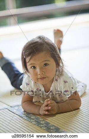 Young Girl Lying on Tatami View Large Photo Image Picture - Young Girl Lying on Tatami. Fotosearch