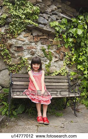 Young Girl on Bench View Large Photo Image Stock Image - Young Girl on Bench. Fotosearch