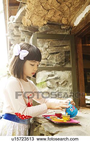 Young Girl Playing with Toy Pots View Large Photo Image Stock Image - Young Girl Playing with Toy Pots. Fotosearch