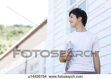 Young Man with Laptop View Large Photo Image Picture - Young Man with Laptop. Fotosearch