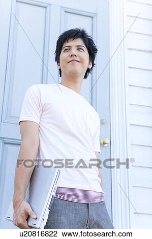 Young Man with Laptop View Large Photo Image Stock Image - Young Man with Laptop. Fotosearch