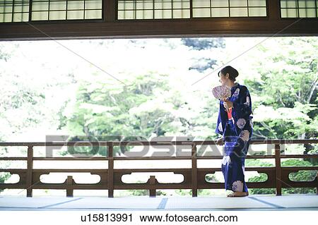 Young Woman in Kimono at Balcony View Large Photo Image Stock Image - Young Woman in Kimono at Balcony. Fotosearch