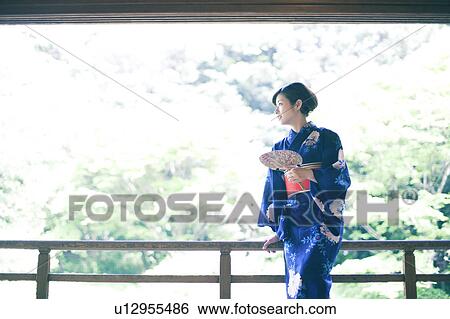 Young Woman in Kimono at Balcony View Large Photo Image Stock Photograph - Young Woman in Kimono at Balcony. Fotosearch