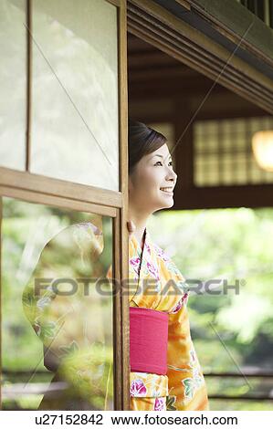 Young Woman in Yukata Looking at View View Large Photo Image Stock Image - Young Woman in Yukata Looking at View. Fotosearch