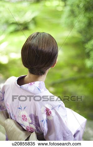 Stock Photography - Young Woman in Yukata, Rear View. Fotosearch
