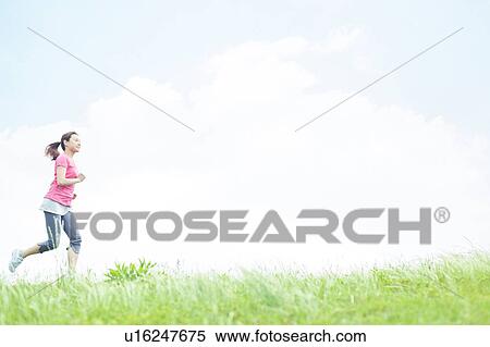 Young Woman Jogging View Large Photo Image Stock Photography - Young Woman Jogging. Fotosearch