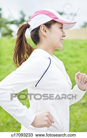 Young Woman Running View Large Photo Image Stock Image - Young Woman Running. Fotosearch