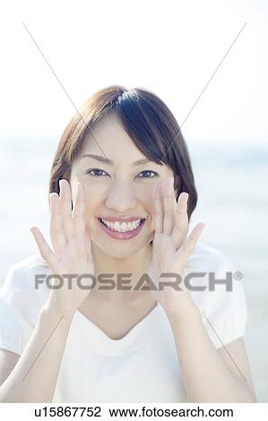 Stock Image - Young Woman Shouting. Fotosearch