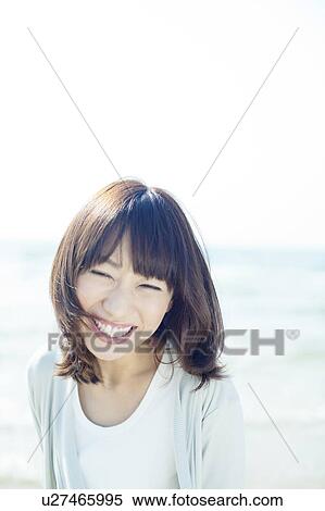 Stock Photography - Young Woman Smiling. Fotosearch