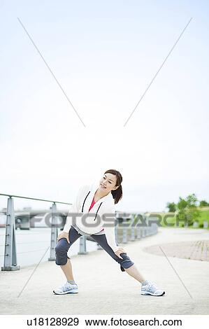 Young Woman Stretching View Large Photo Image Stock Photo - Young Woman Stretching. Fotosearch