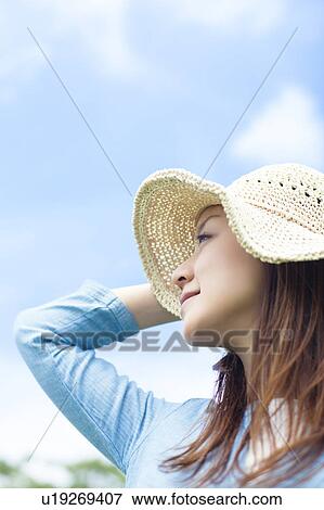 Young Woman Wearing Hat View Large Photo Image Stock Photo - Young Woman Wearing Hat. Fotosearch