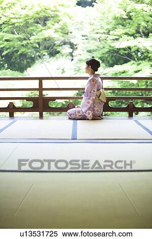 Young Woman Wearing Yukata and Sitting on Tatami View Large Photo Image Stock Photography - Young Woman Wearing Yukata and Sitting on Tatami. Fotosearch