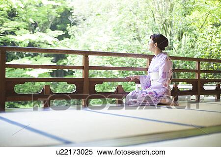 Young Woman Wearing Yukata and Sitting on Tatami View Large Photo Image Stock Photography - Young Woman Wearing Yukata and Sitting on Tatami. Fotosearch