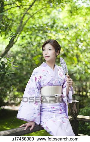 Stock Photo - Young Woman Wearing Yukata. Fotosearch