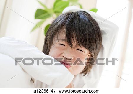 A boy making a funny face View Large Photo Image Stock Photo - A boy making a funny face. Fotosearch