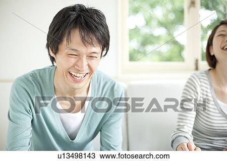Stock Image - A couple smiling. Fotosearch
