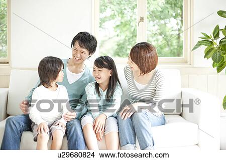 A family smiling View Large Photo Image Picture - A family smiling. Fotosearch