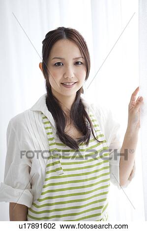 Stock Image - A smiling woman. Fotosearch