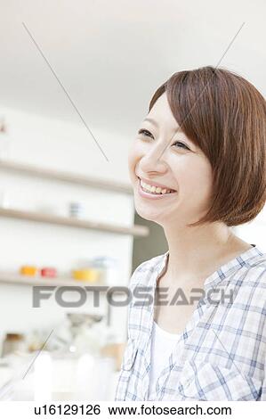 A smiling Woman View Large Photo Image Stock Photograph - A smiling Woman. Fotosearch