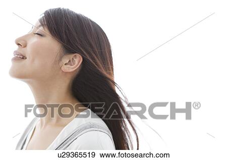 A young woman smiling View Large Photo Image Stock Photo - A young woman smiling. Fotosearch
