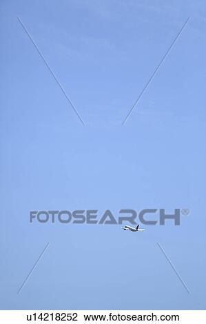 Airplane in the sky, Tokyo Prefecture, Japan View Large Photo Image Stock Image - Airplane in the sky, Tokyo Prefecture, Japan. Fotosearch
