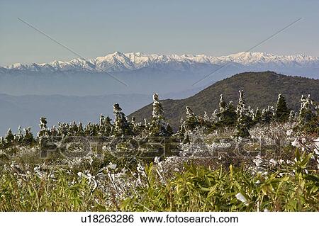 Stock Photograph - Asahi mountain range from Mt. Zao, Yamagata Prefecture, Japan. Fotosearch