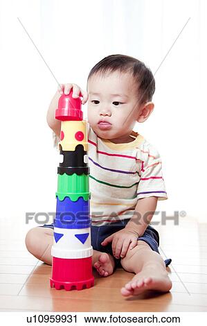 Baby Boy Building Tower with Toy Blocks View Large Photo Image Stock Image - Baby Boy Building Tower with Toy Blocks. Fotosearch