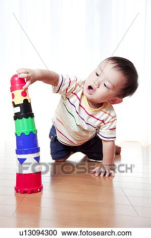 Baby Boy Playing With Toy Blocks View Large Photo Image Stock Image - Baby Boy Playing With Toy Blocks. Fotosearch