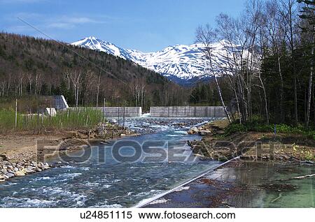 Biei river and Tokachi mountain range, Hokkaido Prefecture, Japan View Large Photo Image Stock Photography - Biei river and Tokachi mountain range, Hokkaido Prefecture, Japan. Fotosearch