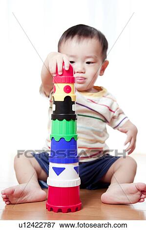 Boy Building with Toy Blocks View Large Photo Image Stock Photo - Boy Building with Toy Blocks. Fotosearch