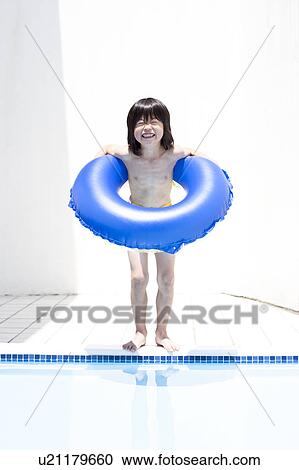 Boy with inflatable smiling, Hyogo Prefecture, Honshu, Japan View Large Photo Image Stock Image - Boy with inflatable smiling, Hyogo Prefecture, Honshu, Japan. Fotosearch