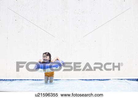 Boy with inflatable smiling, Hyogo Prefecture, Honshu, Japan View Large Photo Image Stock Photography - Boy with inflatable smiling, Hyogo Prefecture, Honshu, Japan. Fotosearch