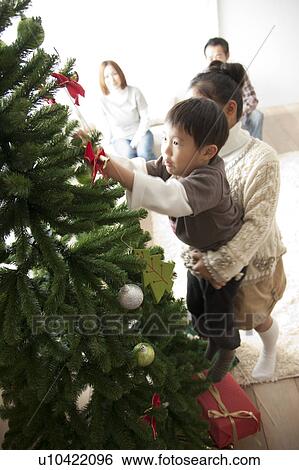 Brother and Sister Decorating Christmas Tree View Large Photo Image Stock Photograph - Brother and Sister Decorating Christmas Tree. Fotosearch