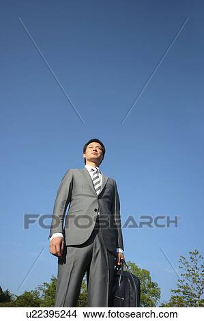 Picture - Businessman Looking Up. Fotosearch