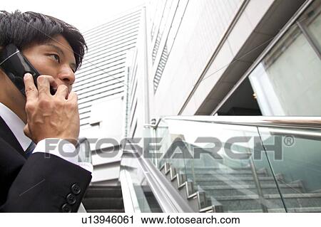 Businessman on the phone View Large Photo Image Stock Image - Businessman on the phone. Fotosearch