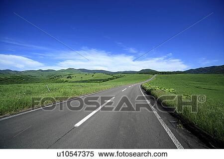 Stock Photography - Curve road, Hokkaido Prefecture, Japan. Fotosearch