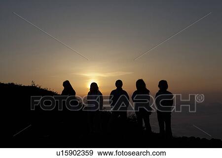 Five People Looking at Sunrise View Large Photo Image Stock Photo - Five People Looking at Sunrise. Fotosearch