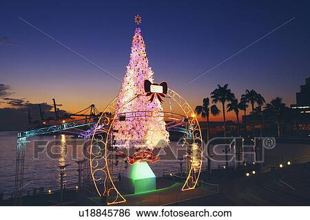 Stock Photograph - Illuminated Christmas tree, Osaka Prefecture, Japan. Fotosearch