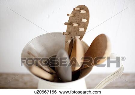 Stock Photograph - Kitchen utensils in a vase, Hyogo Prefecture, Honshu, Japan. Fotosearch