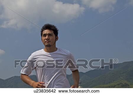 Man jogging, Kyoto Prefecture, Honshu, Japan View Large Photo Image Stock Image - Man jogging, Kyoto Prefecture, Honshu, Japan. Fotosearch