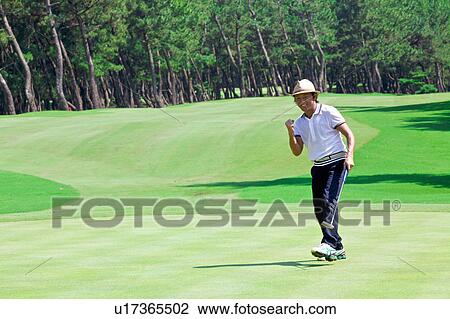 Man playing golf, Miyazaki Prefecture, Kyushu, Japan View Large Photo Image Stock Image - Man playing golf, Miyazaki Prefecture, Kyushu, Japan. Fotosearch
