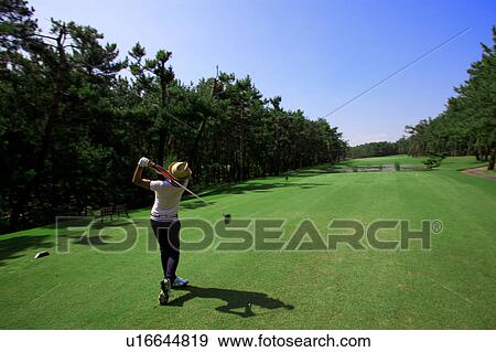 Man playing golf, Miyazaki Prefecture, Kyushu, Japan View Large Photo Image Stock Photo - Man playing golf, Miyazaki Prefecture, Kyushu, Japan. Fotosearch