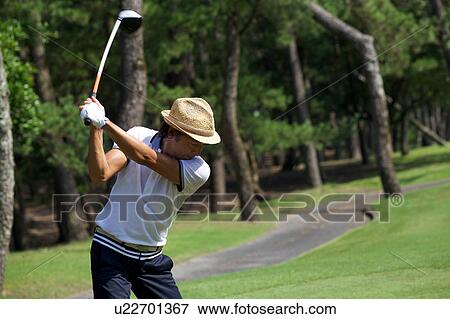 Man playing golf, Miyazaki Prefecture, Kyushu, Japan View Large Photo Image Stock Photo - Man playing golf, Miyazaki Prefecture, Kyushu, Japan. Fotosearch