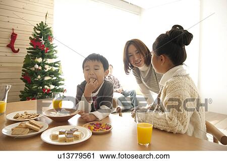 Mother, Daughter and Son at Christmas View Large Photo Image Stock Image - Mother, Daughter and Son at Christmas. Fotosearch